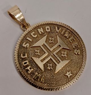 Colgante moneda oro 18k de 1930 y su peso 12,7gr