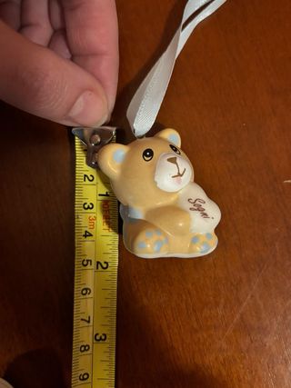 Orsetto in ceramica con fiocco azzurro