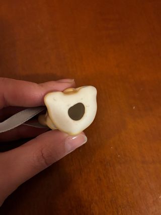 Orsetto in ceramica con fiocco azzurro