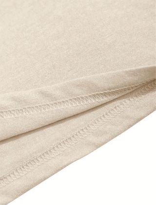 Camiseta beige con estampado de yoga