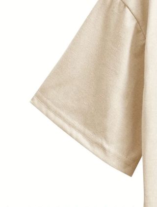 Camiseta beige con estampado de yoga