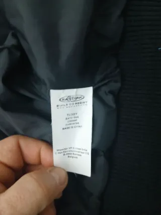 Gilet Eastpak blu con banda nera