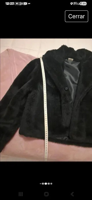 Abrigo corto pelo negro