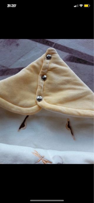 Saco de bebé amarillo