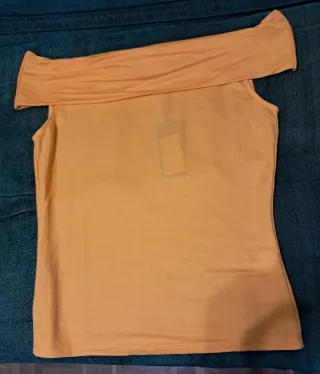 Blusa sin mangas con cuello drapeado