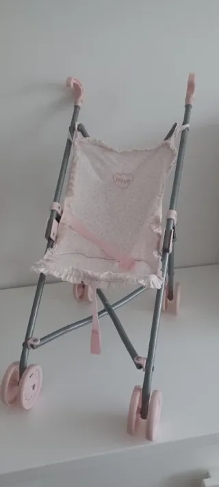 Passeggino per bambole rosa