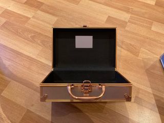 Maletín de juguete oro rosado