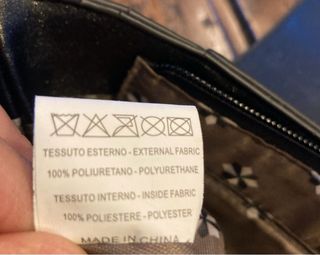 Borsetta Numeroventidue nera con borchie