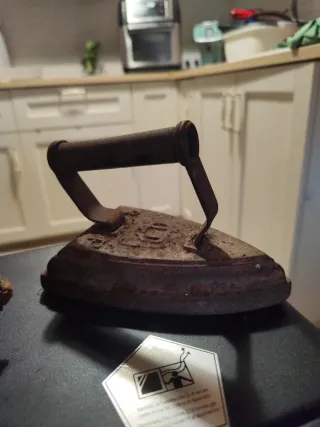 Plancha de hierro antigua