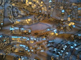 Vestido o blusa de lentejuelas negro