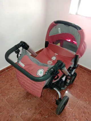 Carrito de bebé rosa
