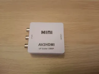 Consola retro, mandos y adaptador HDMI