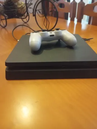 PS4 Slim 1TB Nera + Controller Originale