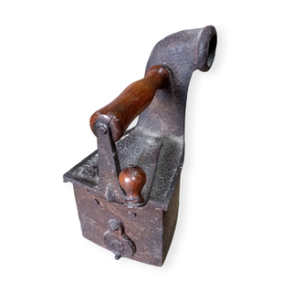 Antigua plancha de carbón de chimenea