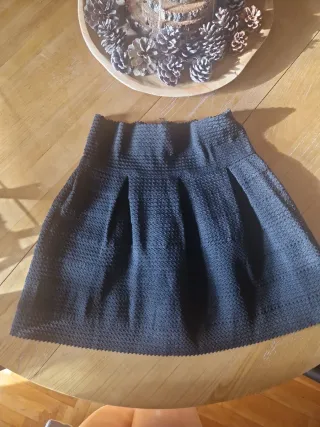 Falda negra drapeada