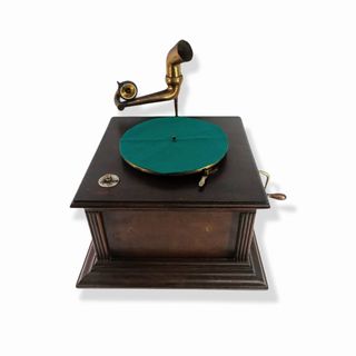 Gramófono antiguo de trompeta verde.