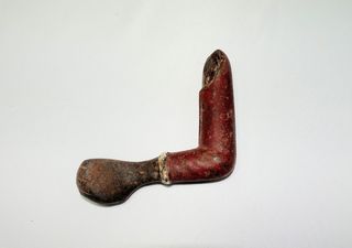 Antigua hucha de hierro Jolly Nigger Bank.