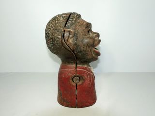 Antigua hucha de hierro Jolly Nigger Bank.