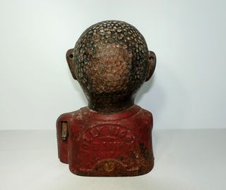 Antigua hucha de hierro Jolly Nigger Bank.