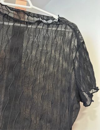 Top negro transparente