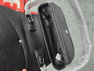 Borsa Diesel nera con tracolla e set