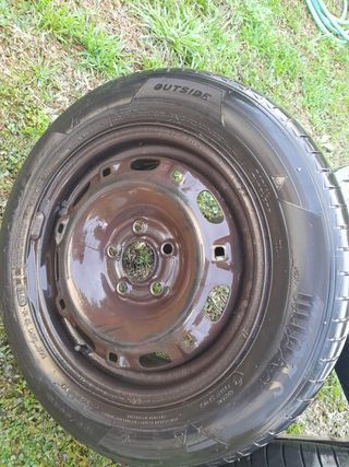 llanta y 2 gomas de recambio como nuevas