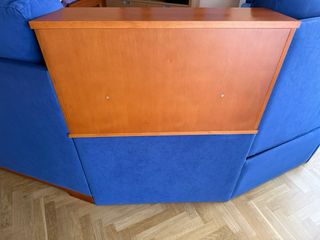 Sofá rinconera azul con sillón reclinable central