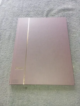 Archivador filatélico Prinz + sellos moçambique