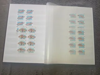 Archivador filatélico Prinz + sellos moçambique