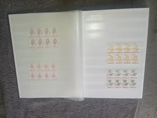 Archivador filatélico Prinz + sellos moçambique