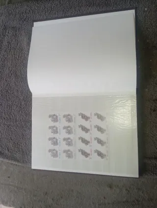 Archivador filatélico Prinz + sellos moçambique