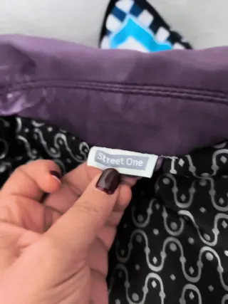 Chaqueta biker de cuero morada para mujer