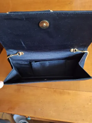 Bolso de fiesta negro con lazo y pedrería