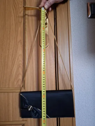 Bolso de fiesta negro con lazo y pedrería