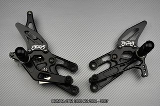 Estriberas retrasadas HONDA CBR 1000 RR 2004 2007