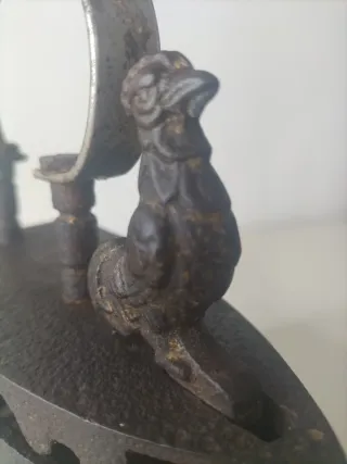 Plancha antigua de hierro fundido