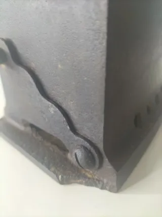 Plancha antigua de hierro fundido