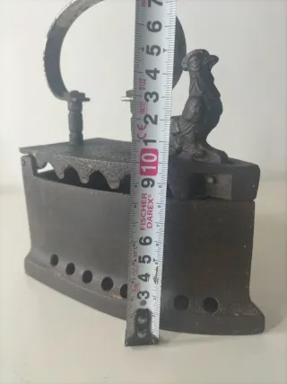 Plancha antigua de hierro fundido