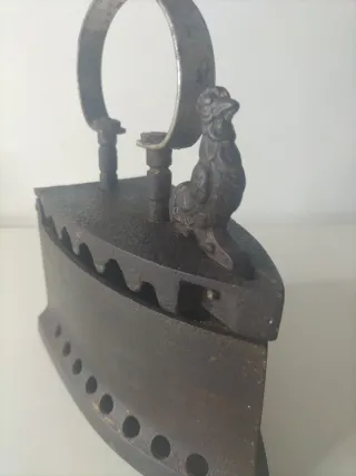 Plancha antigua de hierro fundido