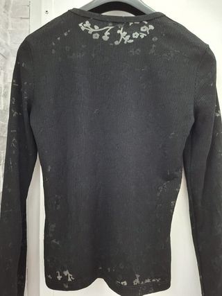 Maglia nera Sisley con fantasia floreale