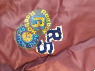 Chaqueta bomber marrón y multicolor