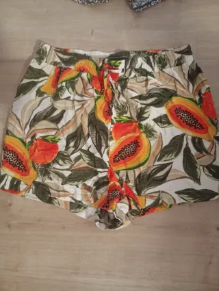 Shorts papaya y hojas