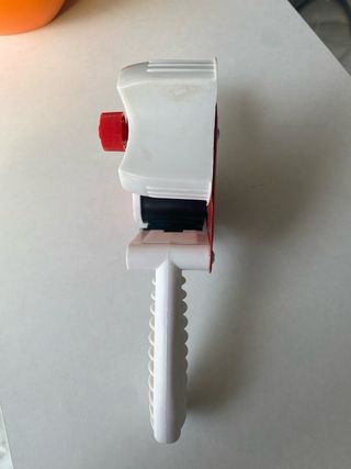 Dispensador de cinta adhesiva rojo y blanco