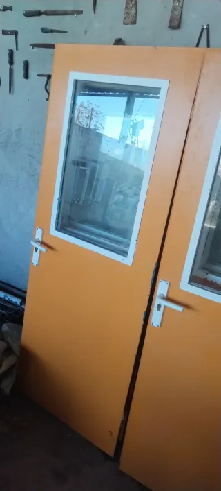 Puerta doble hierro con cristal