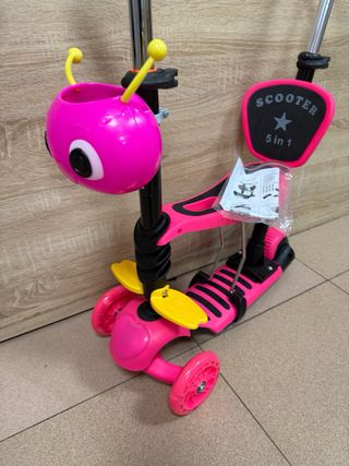 Patinete 3 en 1 rosa con asiento y empujador