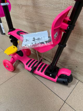 Patinete 3 en 1 rosa con asiento y empujador