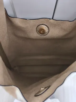 Bolso bandolera dorado tipo saco jobo