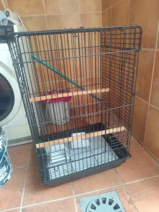 Jaula para loro negra y verde