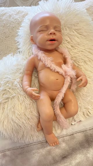 Muñeca silicona niña 33cm