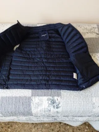 Chaleco azul acolchado